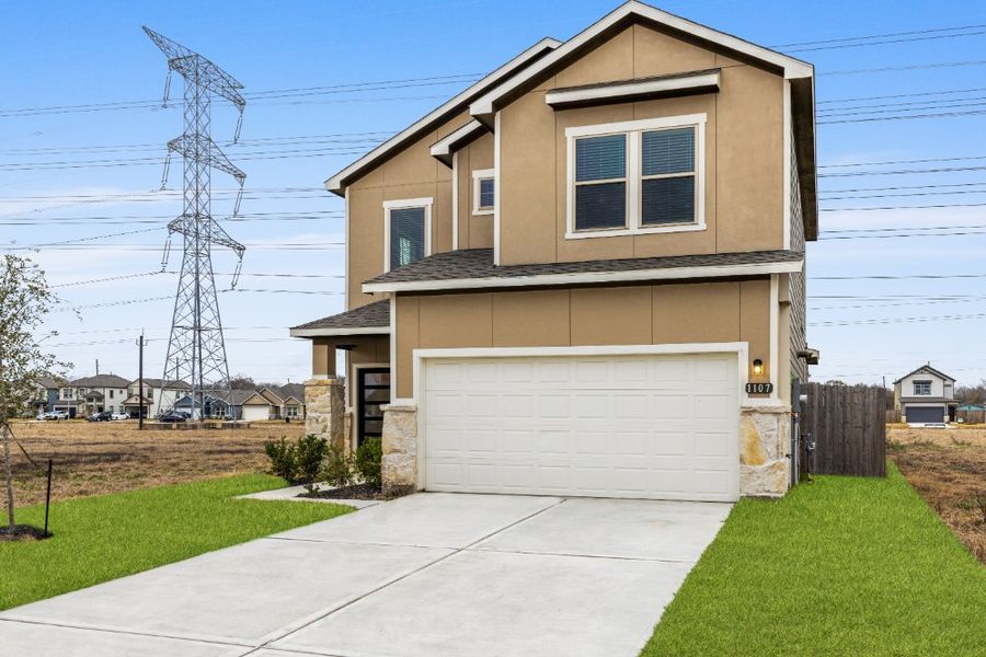 Front exterior of a new home in Glendale Lakes, Rosharon, TX, highlighting curb appeal (Image 35). Front exterior of a new home in Glendale Lakes, Rosharon, TX, highlighting curb appeal (Image 35).