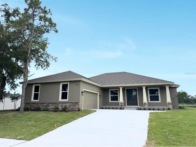 Front exterior of a new home in , Bartow, FL, highlighting curb appeal (Image 1). Front exterior of a new home in , Bartow, FL, highlighting curb appeal (Image 1).