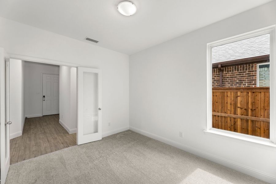Representative unfurnished interior of a home built from the The Tucker by UnionMain Homes in Reunion, Rhome (Image 12).