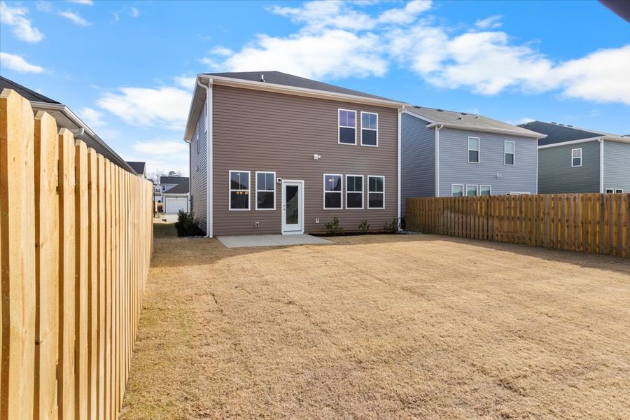 Exterior details and patio area of a home in Windsor, North Augusta (Image 18).