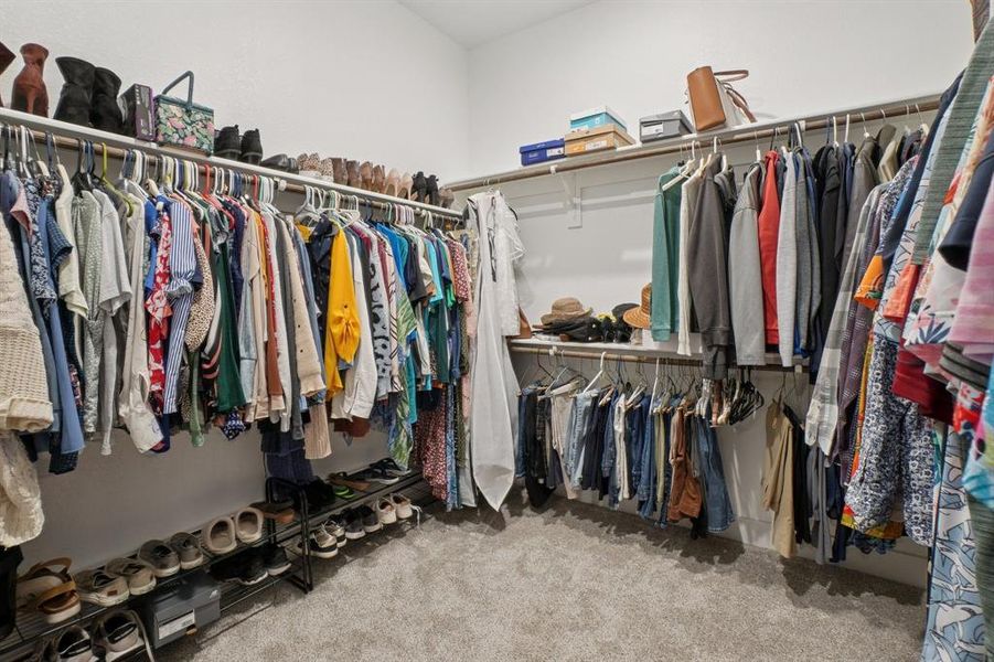 Walk in closet in primary ensuite.