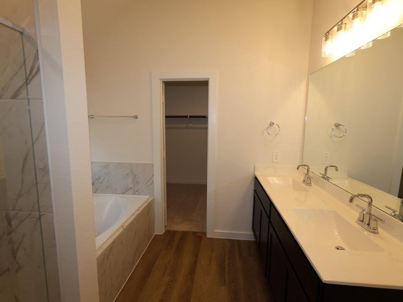 Furnished interior view inside a new home in Pinewood at Grand Texas, New Caney (Image 7). Furnished interior view inside a new home in Pinewood at Grand Texas, New Caney (Image 7).