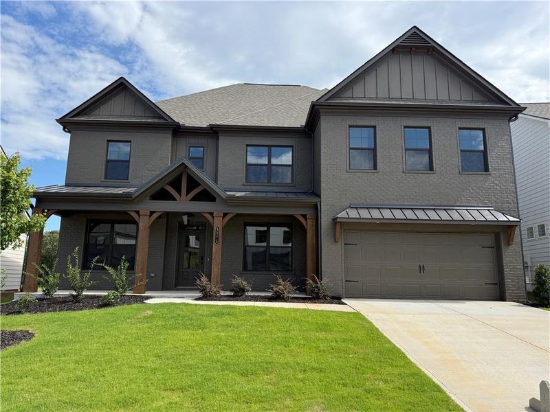 Front exterior of a new home in Ponderosa Farms Reserve, Gainesville, GA, highlighting curb appeal (Image 1). Front exterior of a new home in Ponderosa Farms Reserve, Gainesville, GA, highlighting curb appeal (Image 1).