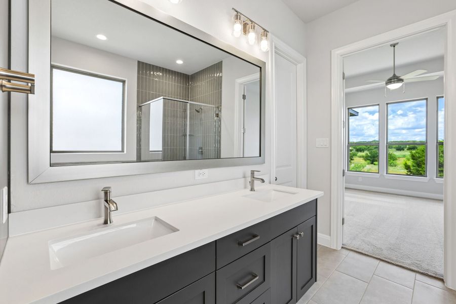 Furnished interior view inside a new home in 6 Creeks, Kyle (Image 10).
