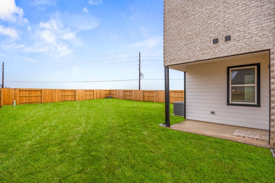 Exterior details and patio area of a home in Creekhaven, Arcola (Image 3).