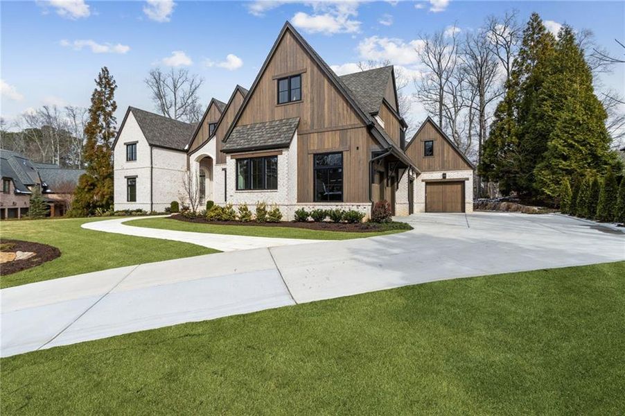 Front exterior of a new home in , Suwanee, GA, highlighting curb appeal (Image 33).