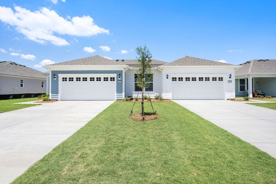 Front exterior of a new home in Sun City Hilton Head, Bluffton, SC, highlighting curb appeal (Image 21). Front exterior of a new home in Sun City Hilton Head, Bluffton, SC, highlighting curb appeal (Image 21).
