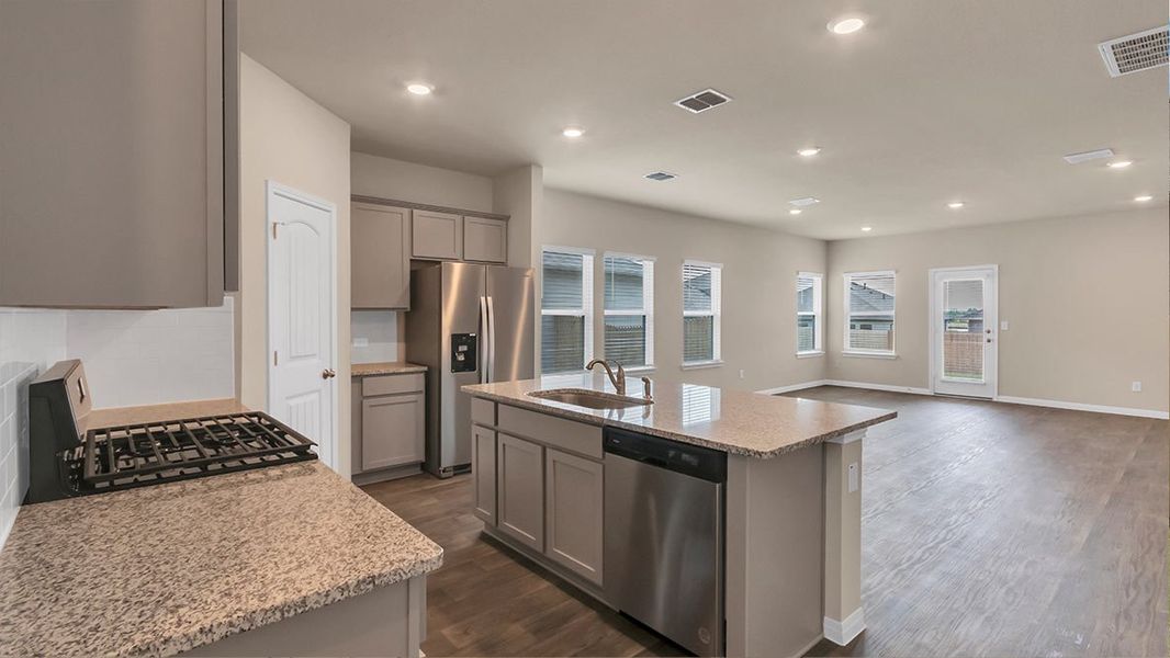 Representative furnished interior of a home built from the The Quincy by D.R. Horton in Monarch Ranch, Manor (Image 4).