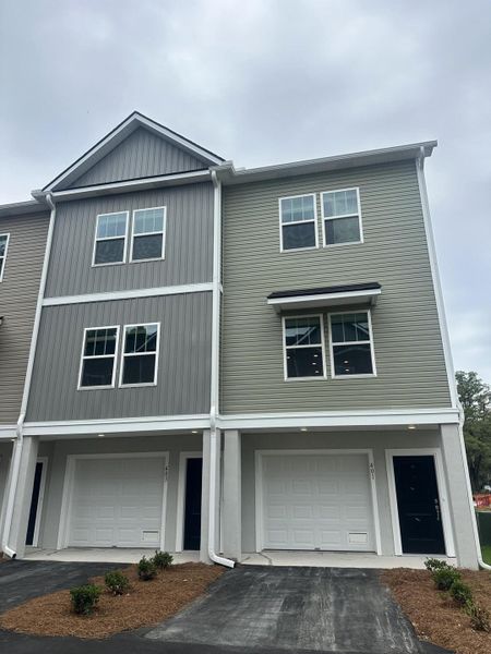 Front exterior of a new home in , Charleston, SC, highlighting curb appeal (Image 1). Front exterior of a new home in , Charleston, SC, highlighting curb appeal (Image 1).