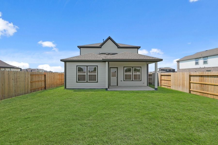 Exterior details and patio area of a home in River Ranch Trails, Dayton (Image 4).