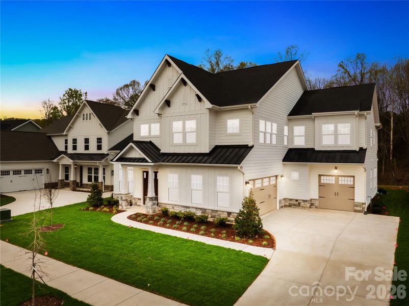 Front exterior of a new home in Coventry Glen, Huntersville, NC, highlighting curb appeal (Image 23).