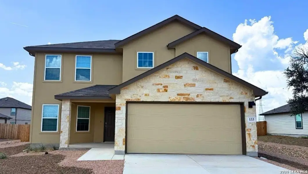 Front exterior of a new home in High Garden, Comfort, TX, highlighting curb appeal (Image 1). Front exterior of a new home in High Garden, Comfort, TX, highlighting curb appeal (Image 1).