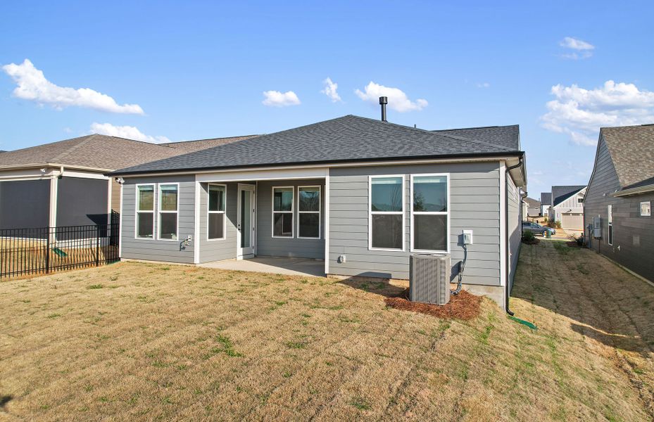 Exterior details and patio area of a home in Carolina Riverside, Belmont (Image 49).