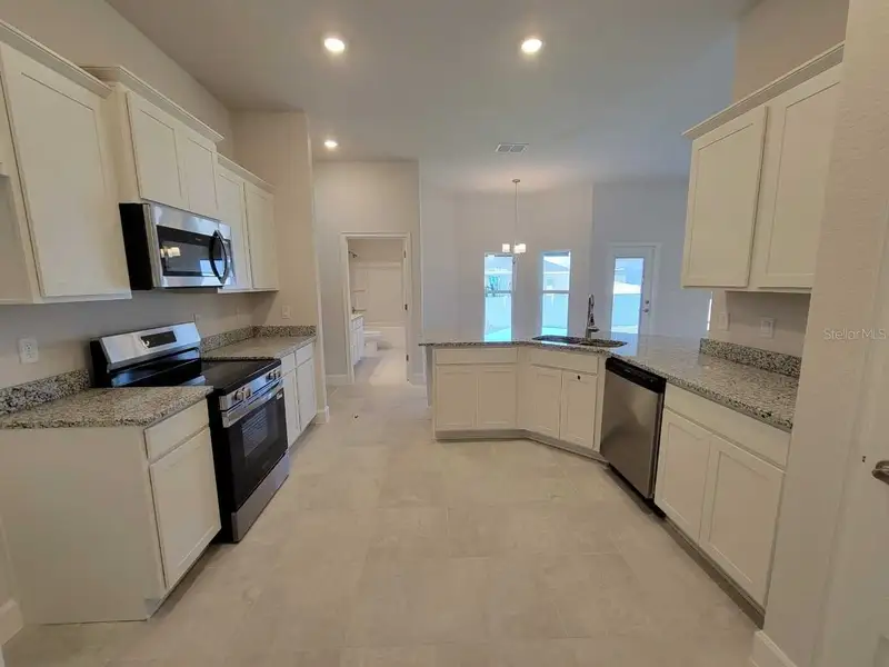 Furnished interior view inside a new home in Ocala Waterway / Kingsland Country Estates, Dunnellon (Image 5).