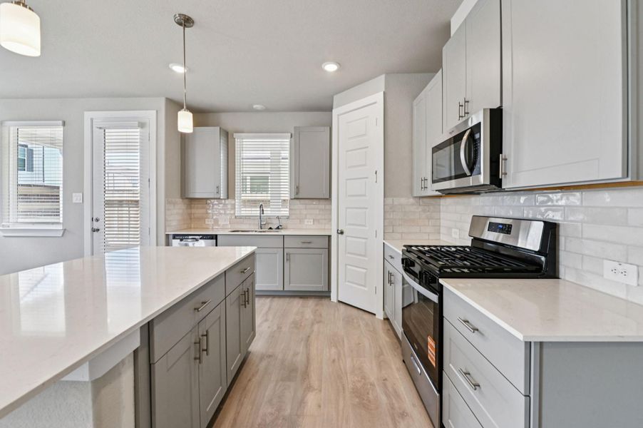 Photo is not of the actual home, but is an inspirational photo of builder’s model home and may depict options, furnishings, and/or decorator features that are not included