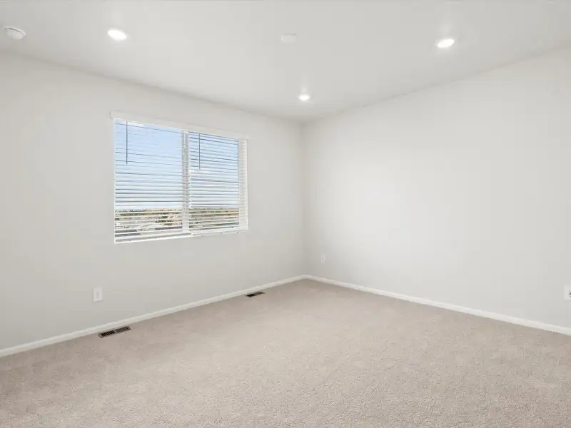 Spacious, unfurnished interior of a new home in Poudre Heights: The Lakes Collection, Windsor (Image 11).