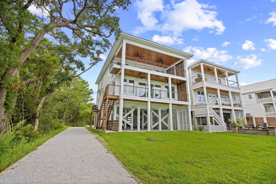 Front exterior of a new home in , Pawleys Island, SC, highlighting curb appeal (Image 20).