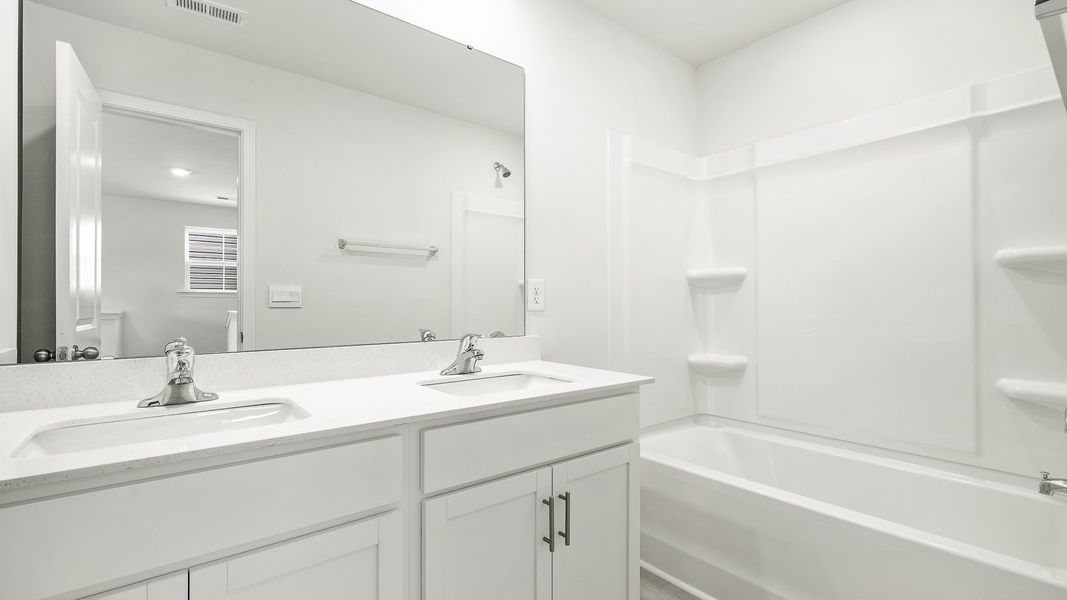 Representative furnished interior of a home built from the WINSTON by D.R. Horton in The Preserve at Kinsley, Jamestown (Image 6).