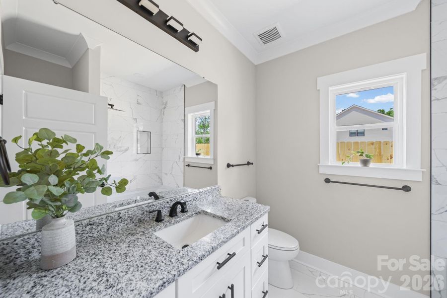 Furnished interior view inside a new home in , Matthews (Image 17).