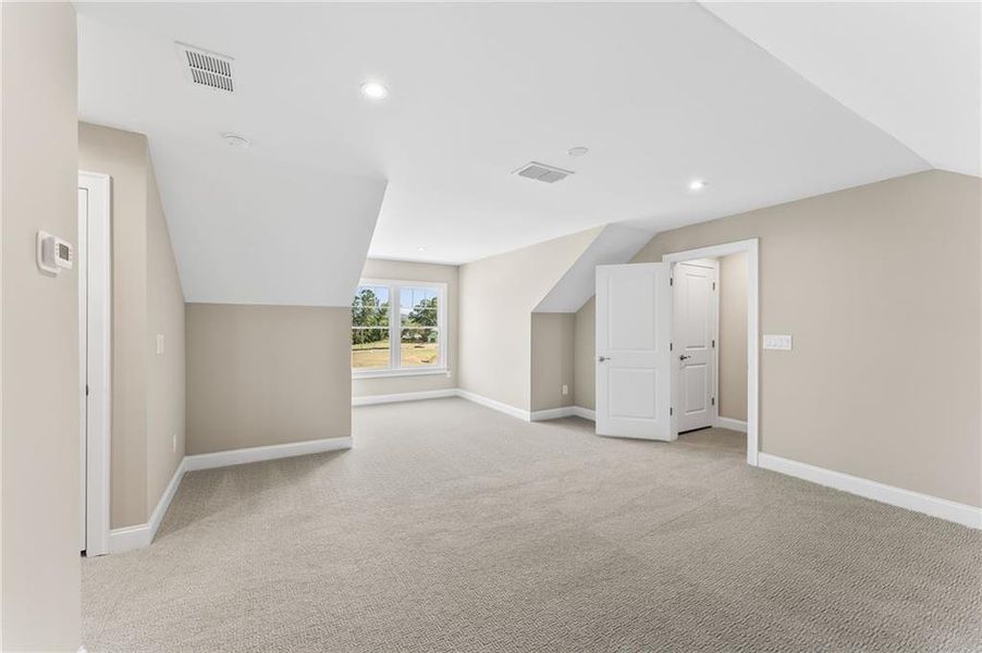 Spacious, unfurnished interior of a new home in The Courtyards at Post Road, Cumming (Image 12).