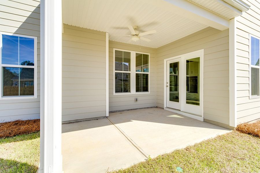 Exterior details and patio area of a home in Pebble Branch, Chapin (Image 3).