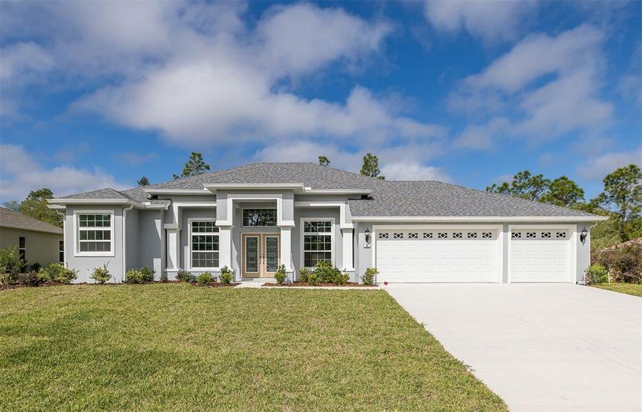 Front exterior of a new home in , Homosassa, FL, highlighting curb appeal (Image 22).