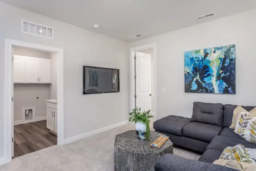Furnished interior view inside a new home in The Townes at Willow Park, Cary (Image 15).