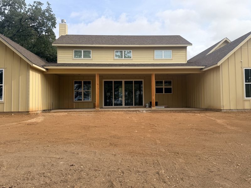 Front exterior of a new home in Monarch Manor, Poolville, TX, highlighting curb appeal (Image 7).