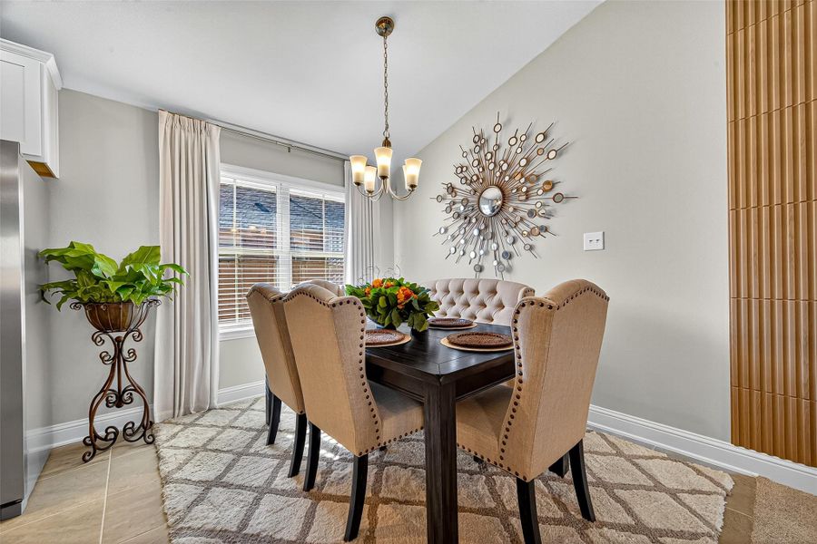 Furnished interior view inside a new home in Sunterra, Katy (Image 35).