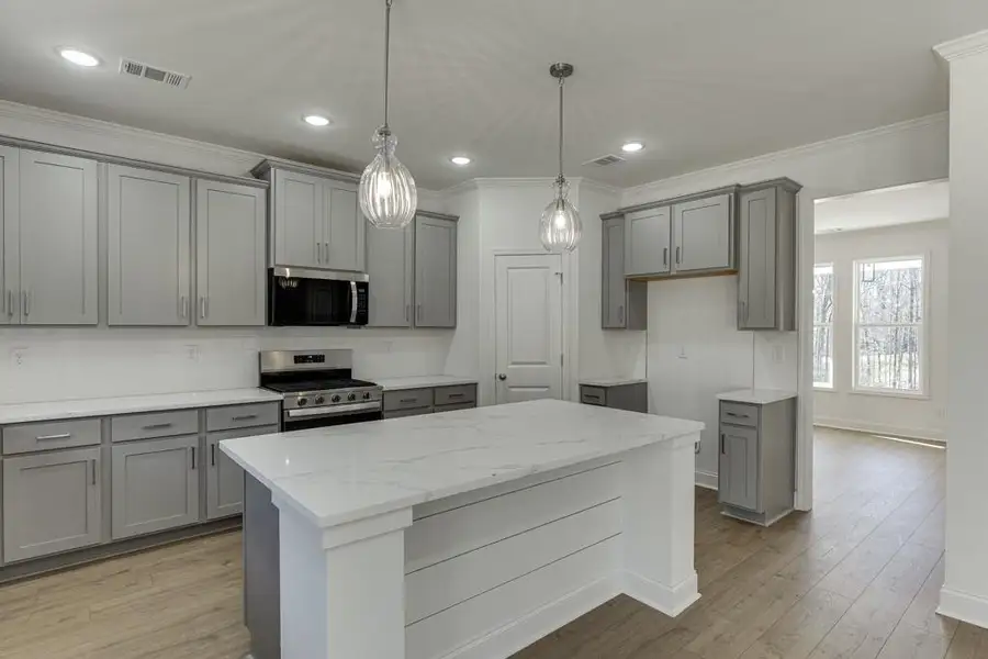 Furnished interior view inside a new home in , Commerce (Image 9).