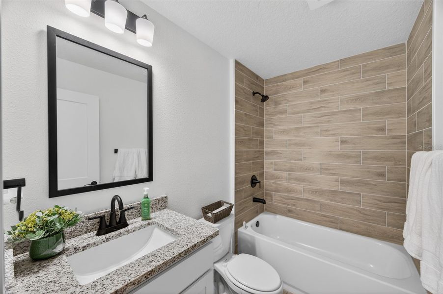 Furnished interior view inside a new home in Hill Country Estates, Dade City (Image 40).
