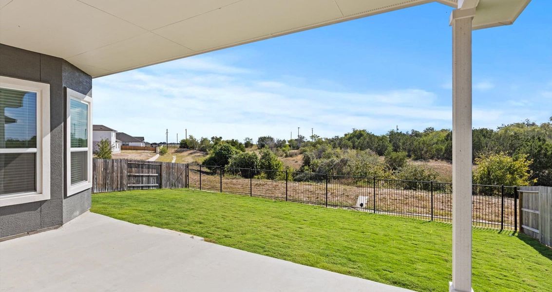 Exterior details and patio area of a home in Village at Three Oaks, Seguin (Image 3).