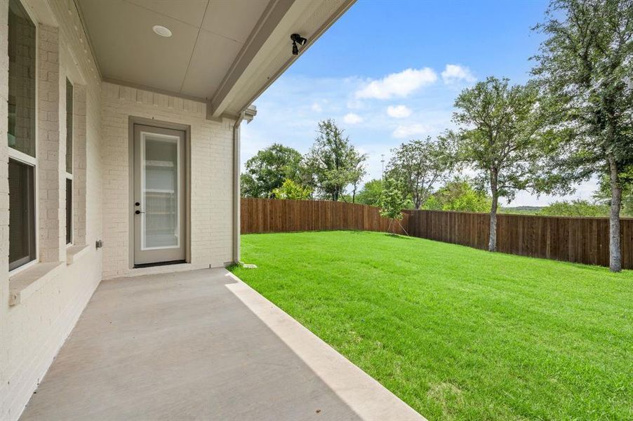 Front exterior of a new home in Parks of Aledo, Aledo, TX, highlighting curb appeal (Image 23). Front exterior of a new home in Parks of Aledo, Aledo, TX, highlighting curb appeal (Image 23).