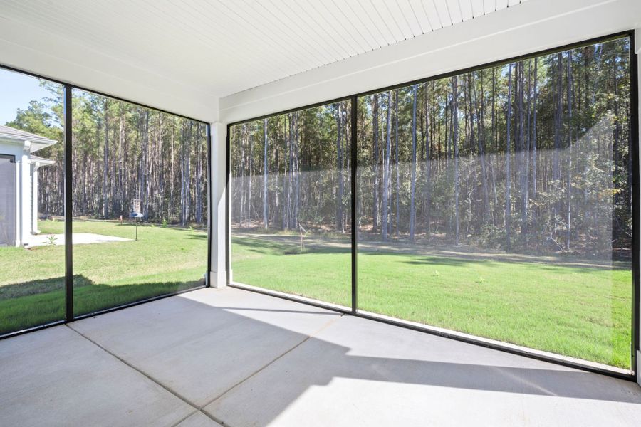 Exterior details and patio area of a home in Sun City Hilton Head, Bluffton (Image 1).
