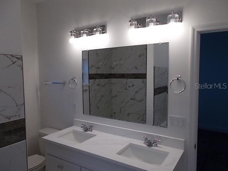 Furnished interior view inside a new home in , Daytona Beach (Image 11).