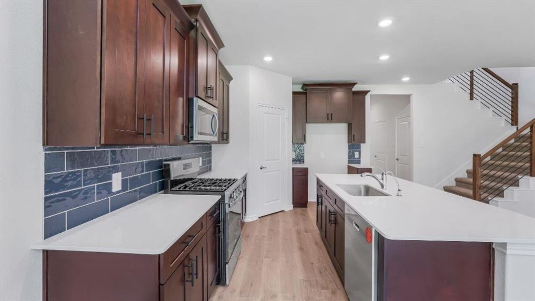 Furnished interior view inside a new home in The Landing at Hidden Lakes, McKinney (Image 5). Furnished interior view inside a new home in The Landing at Hidden Lakes, McKinney (Image 5).