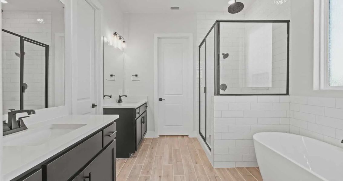 Representative furnished interior of a home built from the Summerton by Chesmar Homes in Village at Three Oaks, Seguin (Image 5).