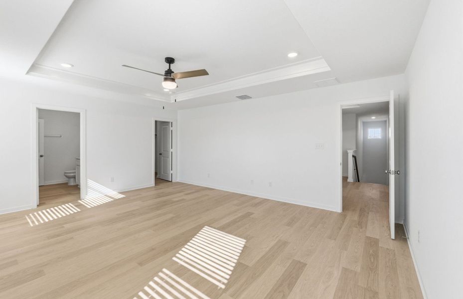 Spacious, unfurnished interior of a new home in Sunfield, Buda (Image 32).