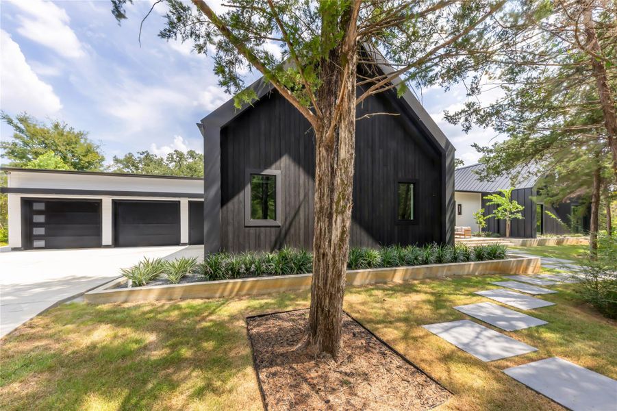 Front exterior of a new home in , College Station, TX, highlighting curb appeal (Image 22).