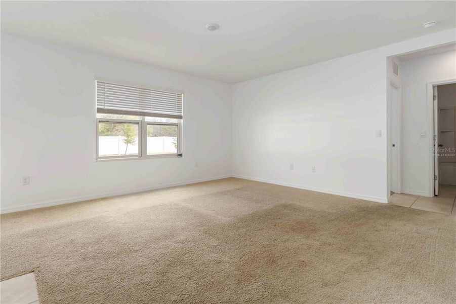 Spacious, unfurnished interior of a new home in , New Smyrna Beach (Image 22).