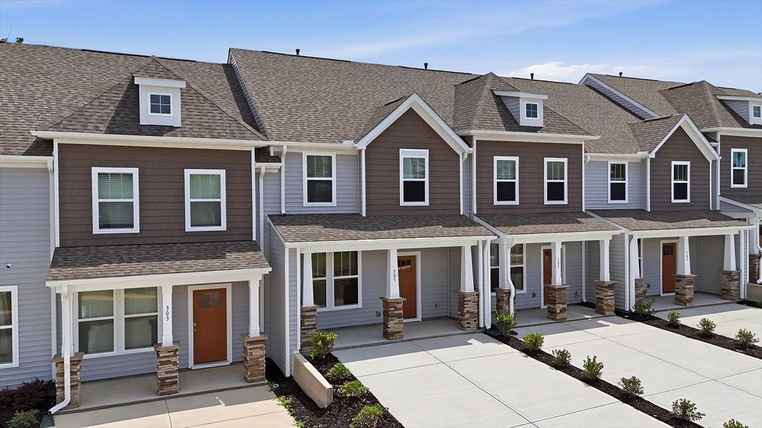 Front exterior of a new home in Clarke Townes, Anderson, SC, highlighting curb appeal (Image 20). Front exterior of a new home in Clarke Townes, Anderson, SC, highlighting curb appeal (Image 20).