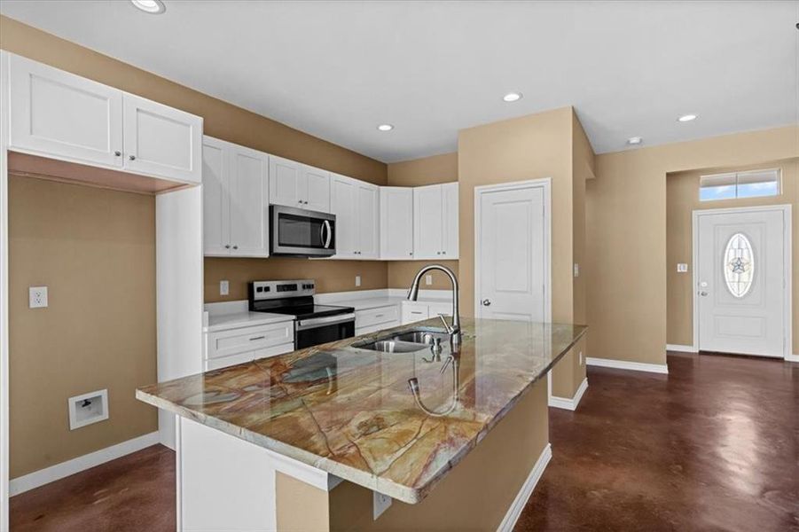 Furnished interior view inside a new home in , Whitney (Image 7). Furnished interior view inside a new home in , Whitney (Image 7).