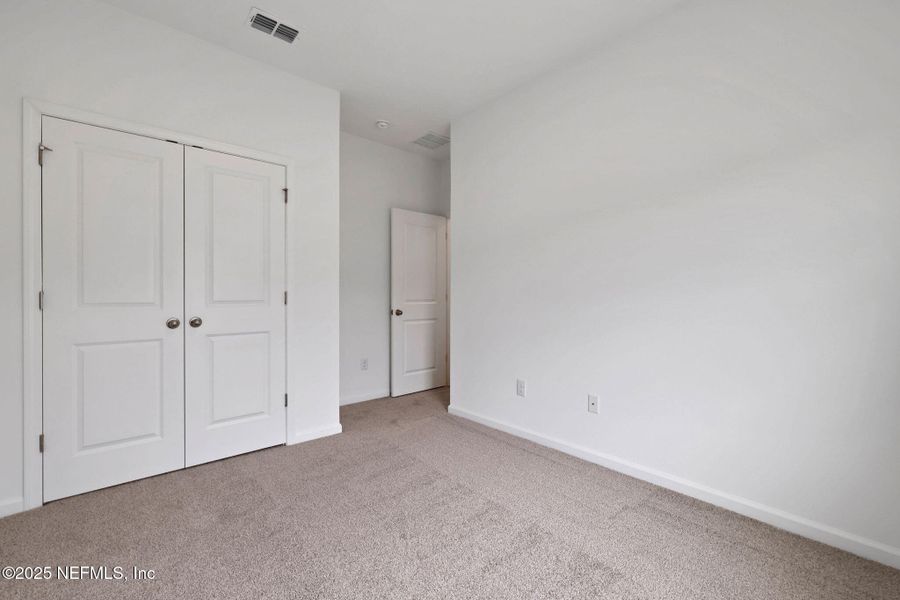 Spacious, unfurnished interior of a new home in TrailMark, St. Augustine (Image 13). Spacious, unfurnished interior of a new home in TrailMark, St. Augustine (Image 13).