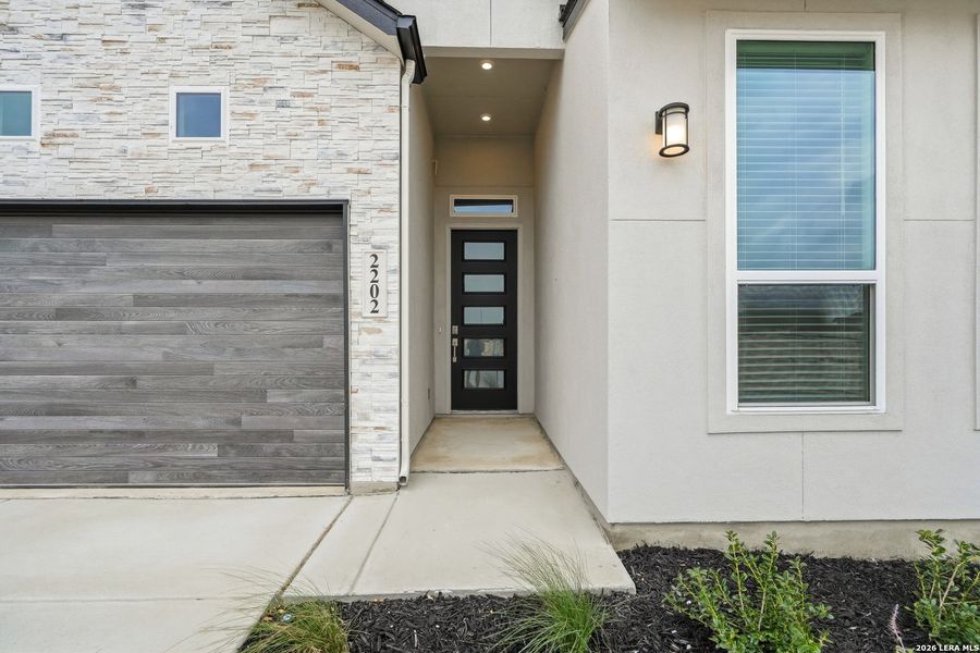Exterior details and patio area of a home in Prominence, San Antonio (Image 4).
