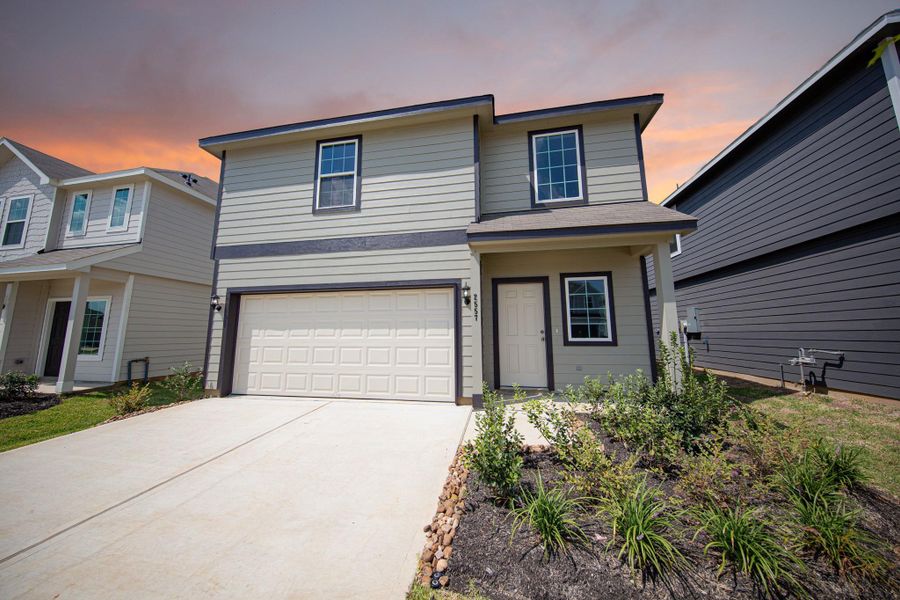 Front exterior of a new home in Cliffstone Hills, Conroe, TX, highlighting curb appeal (Image 13). Front exterior of a new home in Cliffstone Hills, Conroe, TX, highlighting curb appeal (Image 13).