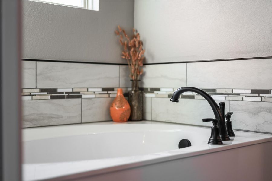 Huge soaking tub with ledges for ipads, wine glasses, and candles