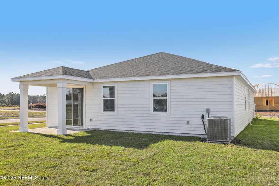 Front exterior of a new home in Lakes at Bella Lago - Signature Series, Green Cove Springs, FL, highlighting curb appeal (Image 22). Front exterior of a new home in Lakes at Bella Lago - Signature Series, Green Cove Springs, FL, highlighting curb appeal (Image 22).