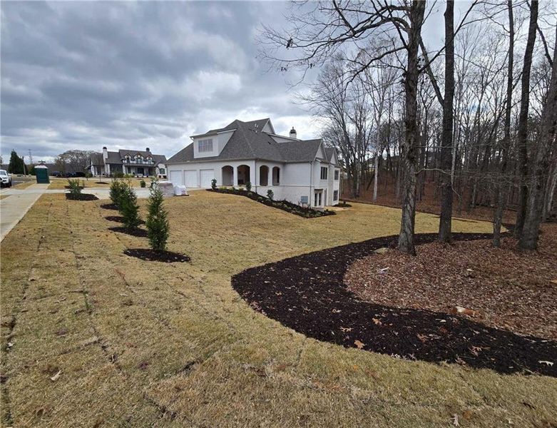 Exterior details and patio area of a home in , Flowery Branch (Image 14).