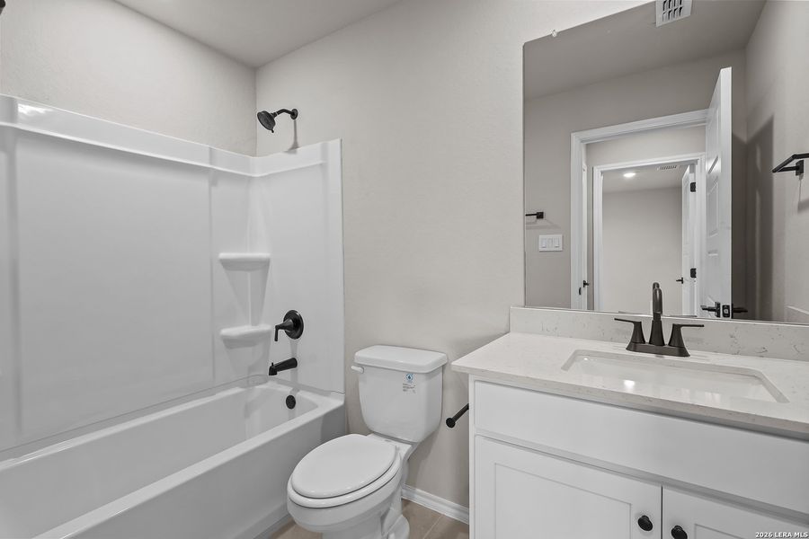 Furnished interior view inside a new home in Royal Crest, San Antonio (Image 21).