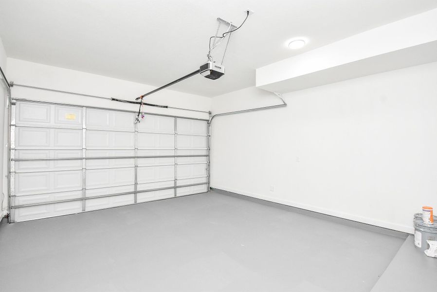 Last but not least, this spacious two-car garage features an ample storage potential. A perfect addition for convenience, security, and organization. Last but not least, this spacious two-car garage features an ample storage potential. A perfect addition for convenience, security, and organization.